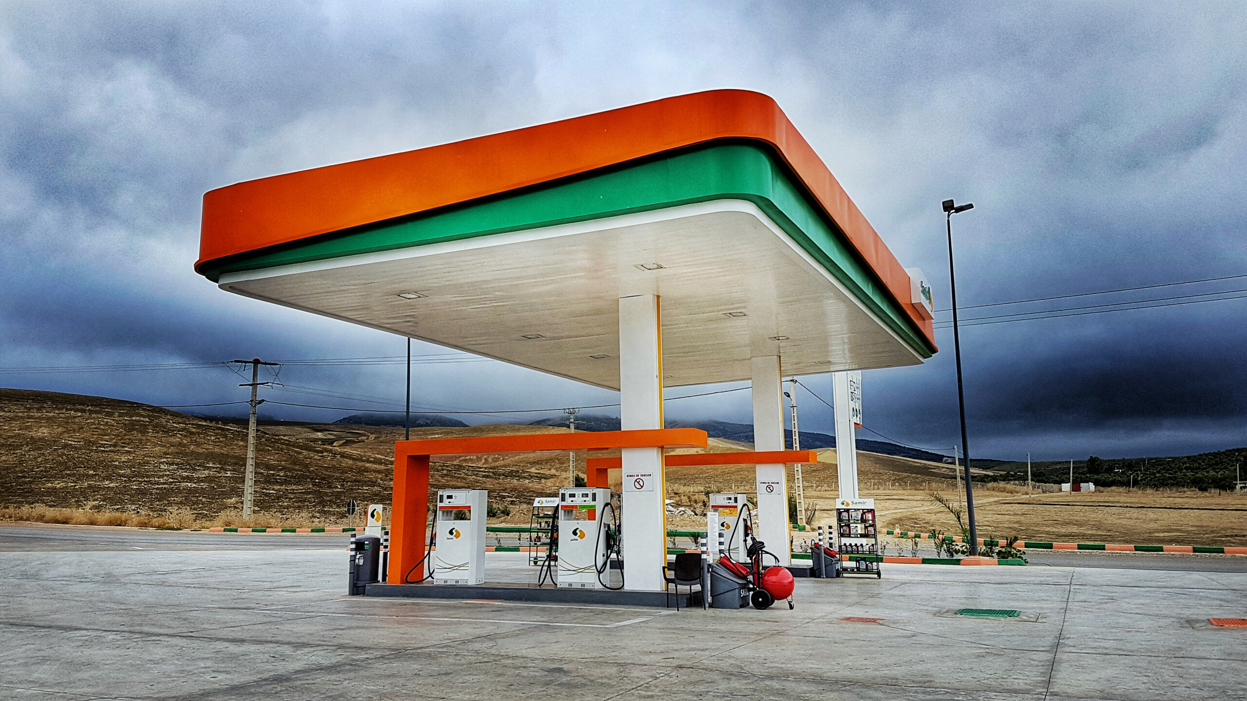 gas station with moody clouds